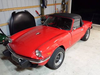 Illustration for article titled NPOCP, Rotary powered 1976 Triumph Spitfire